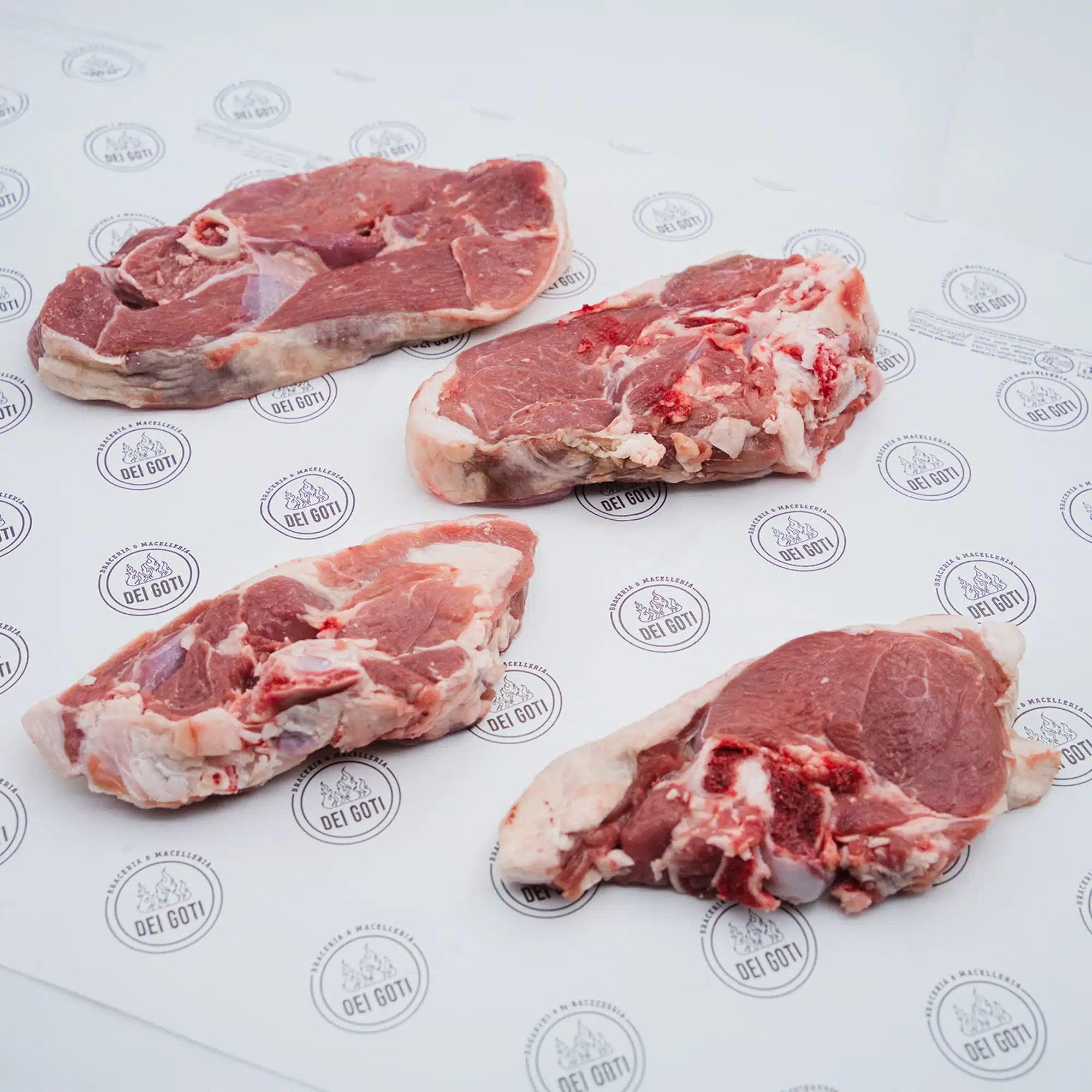 Dettaglio del taglio della coscia di agnello a fette | Braceriadeigoti